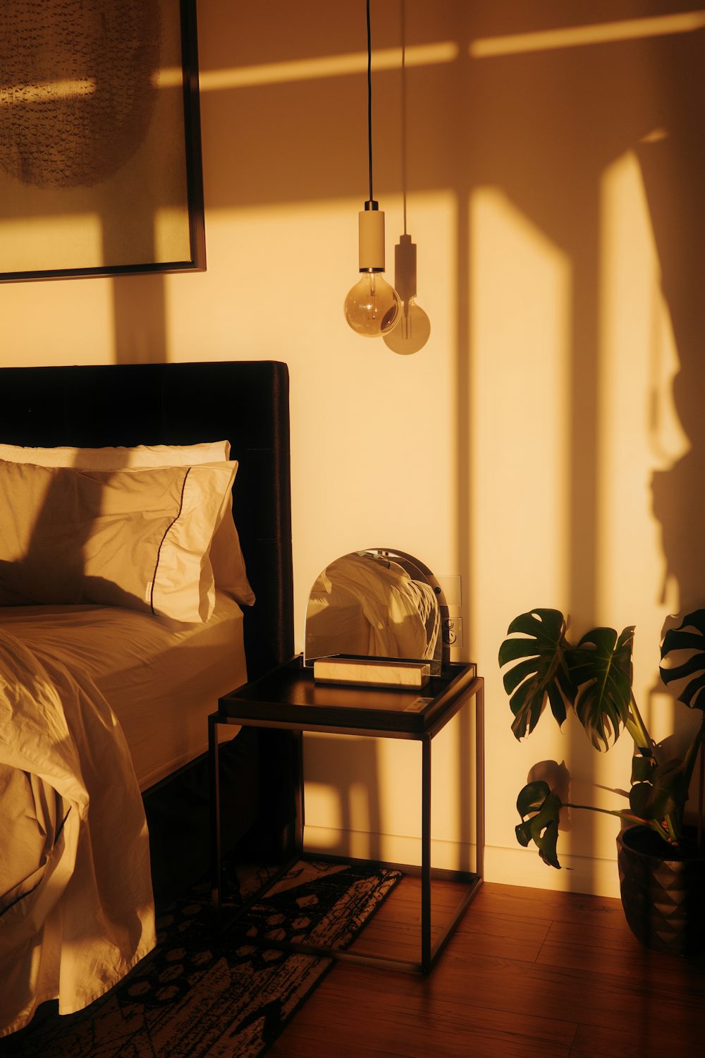 Low evening sun washing across a finished bedroom wall